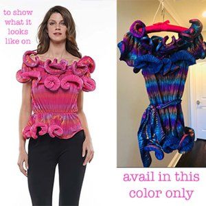 Sold ‼️HOST PICK! ✨✨✨ Iridescent peplum top! A great party or date night shirt!